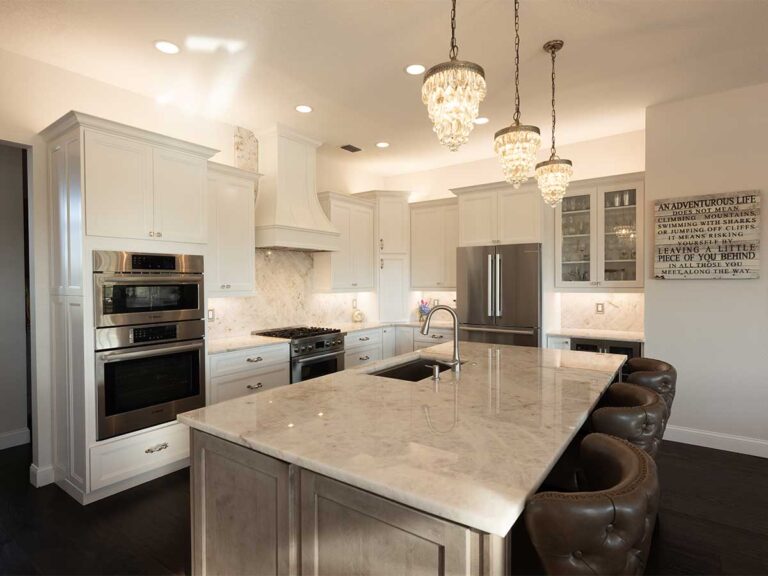 Remodeled kitchen with custom cabinets and stone countertops by Quality By Design Kitchens, Lakewood Ranch area